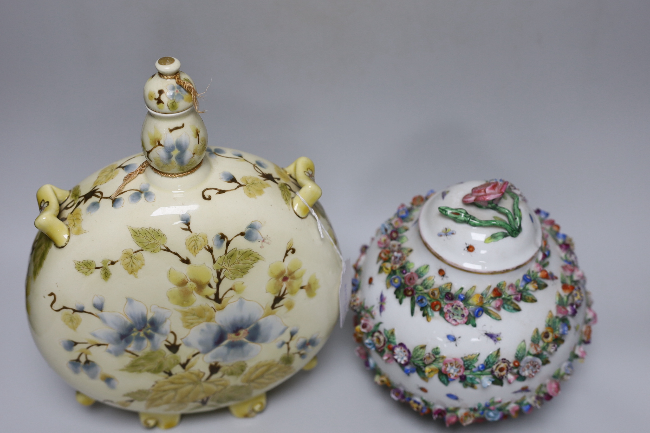 A Zsolnay Pecs pottery moonflask and a Herend porcelain flower encrusted jar and cover, c.1895, tallest 33cm